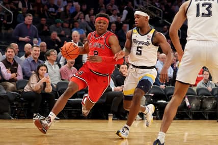 Mar 9, 2023; New York, NY, USA; St. John's Red Storm guard AJ Storr (2) drives to the basket against Marquette Golden Eagles guard Chase Ross (5) during the first half at Madison Square Garden. Mandatory Credit: Brad Penner-USA TODAY Sports