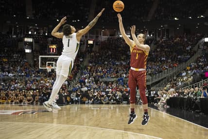 Mar 9, 2023; Kansas City, MO, USA; Iowa State Cyclones guard Eli King (1) shoots against Baylor Bears guard Keyonte George (1) in the first half at T-Mobile Center. Mandatory Credit: Amy Kontras-USA TODAY Sports