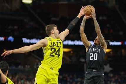 Mar 9, 2023; Orlando, Florida, USA;  Orlando Magic guard Markelle Fultz (20) shoots the ball over Utah Jazz center Walker Kessler (24) in the second quarter at Amway Center. Mandatory Credit: Nathan Ray Seebeck-USA TODAY Sports