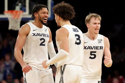 Mar 9, 2023; New York, NY, USA; Xavier Musketeers guard Colby Jones (3) celebrates with forward Jerome Hunter (2) and guard Adam Kunkel (5) during the second half against the DePaul Blue Demons at Madison Square Garden. Mandatory Credit: Brad Penner-USA TODAY Sports