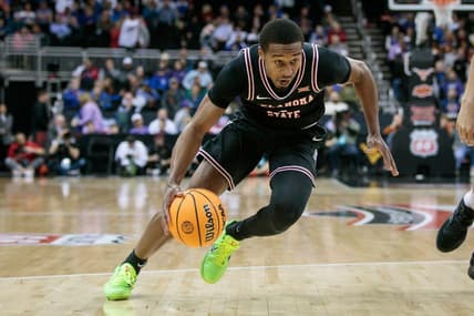 Mar 9, 2023; Kansas City, MO, USA; Oklahoma State Cowboys guard Bryce Thompson (1) drives to the basket during the second half against the Texas Longhorns at T-Mobile Center. Mandatory Credit: William Purnell-USA TODAY Sports
