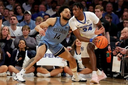 Mar 9, 2023; New York, NY, USA; Creighton Bluejays forward Arthur Kaluma (24) controls the ball against Villanova Wildcats guard Caleb Daniels (14) during the first half at Madison Square Garden. Mandatory Credit: Brad Penner-USA TODAY Sports