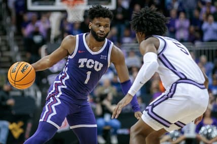 Mar 9, 2023; Kansas City, MO, USA; TCU Horned Frogs guard Mike Miles Jr. (1) is defended by Kansas State Wildcats guard Cam Carter (5) during the second half at T-Mobile Center. Mandatory Credit: William Purnell-USA TODAY Sports
