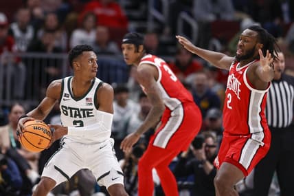 Mar 10, 2023; Chicago, IL, USA; Michigan State Spartans guard Tyson Walker (2) looks to pass the ball against Ohio State Buckeyes guard Bruce Thornton (2) during the first half at United Center. Mandatory Credit: Kamil Krzaczynski-USA TODAY Sports