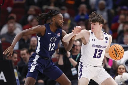 Mar 10, 2023; Chicago, IL, USA; Penn State Nittany Lions guard Evan Mahaffey (12) defends against Northwestern Wildcats guard Brooks Barnhizer (13) during the first half at United Center. Mandatory Credit: Kamil Krzaczynski-USA TODAY Sports