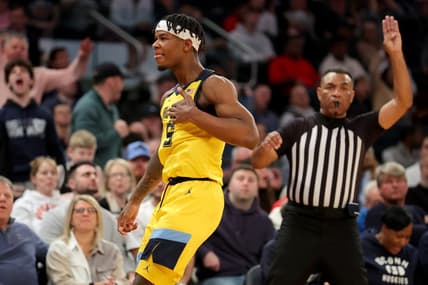 Mar 10, 2023; New York, NY, USA; Marquette Golden Eagles guard Chase Ross (5) reacts after making a three point shot against the Connecticut Huskies during the second half at Madison Square Garden. Mandatory Credit: Brad Penner-USA TODAY Sports
