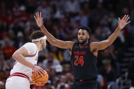 Mar 10, 2023; Chicago, IL, USA; Maryland Terrapins forward Donta Scott (24) defends against Indiana Hoosiers forward Race Thompson (left) at United Center. Mandatory Credit: Kamil Krzaczynski-USA TODAY Sports
