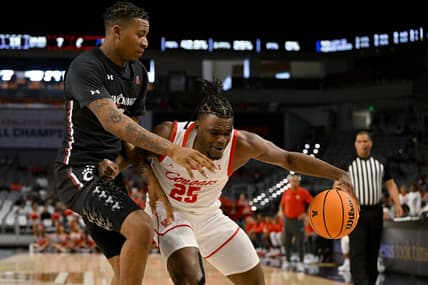 Mar 11, 2023; Fort Worth, TX, USA; Cincinnati Bearcats guard Landers Nolley II (2) battles for the ball with Houston Cougars forward Jarace Walker (25) during the first half at Dickies Arena. Mandatory Credit: Jerome Miron-USA TODAY Sports