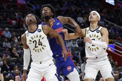 Mar 11, 2023; Detroit, Michigan, USA;  Indiana Pacers guard Buddy Hield (24) Detroit Pistons center James Wiseman (13) and Pacers guard Andrew Nembhard (2) look for a rebound in the first half at Little Caesars Arena. Mandatory Credit: Rick Osentoski-USA TODAY Sports