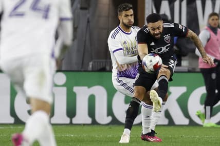 Mar 11, 2023; Washington, District of Columbia, USA; D.C. United defender Derrick Williams (3) clears the ball from Orlando City SC midfielder Mart n Ojeda (11) in the second half at Audi Field. Mandatory Credit: Geoff Burke-USA TODAY Sports