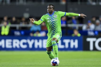 Mar 11, 2023; Cincinnati, Ohio, USA;  Seattle Sounders FC defender Nouhou (5) dribbles the ball against FC Cincinnati in the second half at TQL Stadium. Mandatory Credit: Aaron Doster-USA TODAY Sports