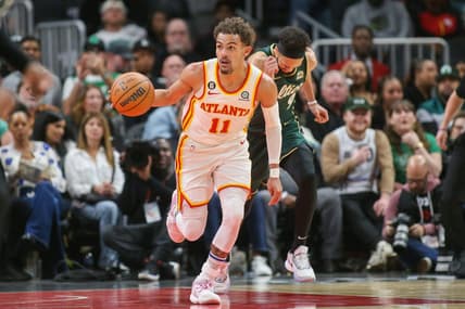Mar 11, 2023; Atlanta, Georgia, USA; Atlanta Hawks guard Trae Young (11) dribbles against the Boston Celtics in the second half at State Farm Arena. Mandatory Credit: Brett Davis-USA TODAY Sports