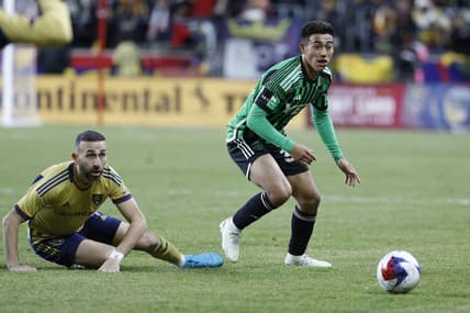 Mar 11, 2023; Sandy, Utah, USA; Austin FC midfielder Owen Wolff (33) looks to chase the ball against Real Salt Lake forward Justin Meram (9) in the second half at America First Field. Mandatory Credit: Jeffrey Swinger-USA TODAY Sports