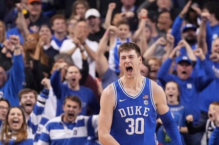 Mar 11, 2023; Greensboro, NC, USA;  Duke Blue Devils center Kyle Filipowski (30) reacts after scoring in the second half of the Championship game of the ACC Tournament at Greensboro Coliseum. Mandatory Credit: Bob Donnan-USA TODAY Sports