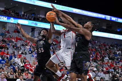 Mar 12, 2023; Fort Worth, TX, USA; Memphis Tigers guard Damaria Franklin (55) and forward Chandler Lawson (4) and Houston Cougars guard Jamal Shead (1) battle for control of the ball during the first half at Dickies Arena. Mandatory Credit: Jerome Miron-USA TODAY Sports