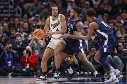 Mar 12, 2023; Chicago, IL, USA; Penn State Nittany Lions guard Myles Dread (2) defends against Purdue Boilermakers forward Trey Kaufman-Renn (4) during the first half at United Center. Mandatory Credit: Kamil Krzaczynski-USA TODAY Sports