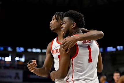 Mar 12, 2023; Fort Worth, TX, USA; Houston Cougars guard Tramon Mark (12) hugs guard Jamal Shead (1) during the second half against the Memphis Tigers at Dickies Arena. Mandatory Credit: Jerome Miron-USA TODAY Sports