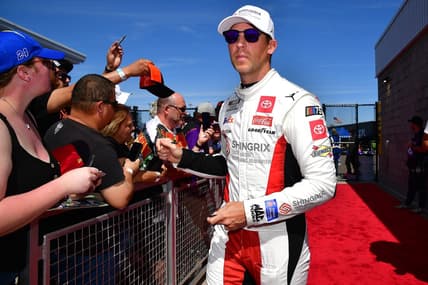 Mar 12, 2023; Avondale, Arizona, USA; NASCAR Cup Series driver Denny Hamlin (11) before the United Rentals Work United 500 at Phoenix Raceway. Mandatory Credit: Gary A. Vasquez-USA TODAY Sports