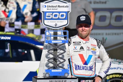 Mar 12, 2023; Avondale, Arizona, USA; NASCAR Cup Series driver William Byron (24) celebrates his victory of the United Rentals Work United 500 at Phoenix Raceway. Mandatory Credit: Gary A. Vasquez-USA TODAY Sports
