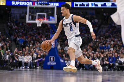 Mar 13, 2023; Dallas, Texas, USA; Dallas Mavericks guard Josh Green (8) brings the ball up court against the Memphis Grizzlies during the second half at the American Airlines Center. Mandatory Credit: Jerome Miron-USA TODAY Sports