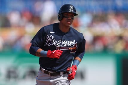 Mar 14, 2023; Clearwater, Florida, USA;  Atlanta Braves third baseman Ehire Adrianza (9) rounds the bases after hitting a grand slam home run against the Philadelphia Phillies in the fifth inning during spring training at BayCare Ballpark. Mandatory Credit: Nathan Ray Seebeck-USA TODAY Sports