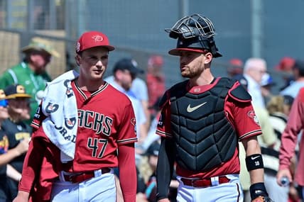 Mar 14, 2023; Salt River Pima-Maricopa, Arizona, USA; Arizona Diamondbacks starting pitcher Tommy Henry (47) and catcher Carson Kelly (18) walk in from the bullpen prior to a Spring Training game against the San Francisco Giants at Salt River Fields at Talking Stick. Mandatory Credit: Matt Kartozian-USA TODAY Sports