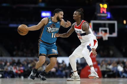Mar 14, 2023; Washington, District of Columbia, USA; Detroit Pistons guard Cory Joseph (18) dribbles the ball as Washington Wizards guard Delon Wright (55) defends in the second quarter at Capital One Arena. Mandatory Credit: Geoff Burke-USA TODAY Sports