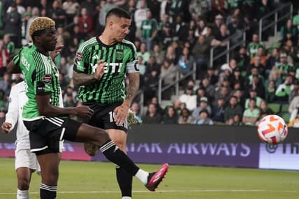 Mar 14, 2023; Austin, TX, USA; Austin FC forward Sebastian Driussi (10) shoots a goal off of his arm in front of forward Gyasi Zardes (9) during the second half against Violette AC at Q2 Stadium. Mandatory Credit: Scott Wachter-USA TODAY Sports