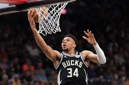 Mar 14, 2023; Phoenix, Arizona, USA; Milwaukee Bucks forward Giannis Antetokounmpo (34) puts up a layup against the Phoenix Suns during the first half at Footprint Center. Mandatory Credit: Joe Camporeale-USA TODAY Sports