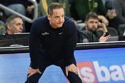 Mar 7, 2023; Sioux Falls, SD, USA;  Oral Roberts Golden Eagles head coach Paul Mills watches action against the North Dakota State Bison in the first half at Denny Sanford Premier Center. Mandatory Credit: Steven Branscombe-USA TODAY Sports