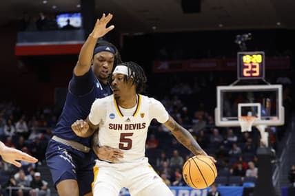 Mar 15, 2023; Dayton, OH, USA; Arizona State Sun Devils forward Jamiya Neal (5) dribbles the ball defend by Nevada Wolf Pack forward Tre Coleman (14) in the second half at UD Arena. Mandatory Credit: Rick Osentoski-USA TODAY Sports