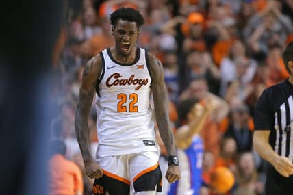 Oklahoma State Cowboys forward Kalib Boone (22) celebrates during a men's college basketball game between the Oklahoma State University Cowboys and the Kansas Jayhawks at Gallagher-Iba Arena in Stillwater, Okla., Wednesday, Feb. 15, 2023.

osu mbb