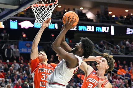 Mar 16, 2023; Des Moines, IA, USA; Arkansas Razorbacks forward Makhi Mitchell (15) shoots the ball against Illinois Fighting Illini forward Coleman Hawkins (33) and forward Matthew Mayer (24) during the first half at Wells Fargo Arena. Mandatory Credit: Jeffrey Becker-USA TODAY Sports
