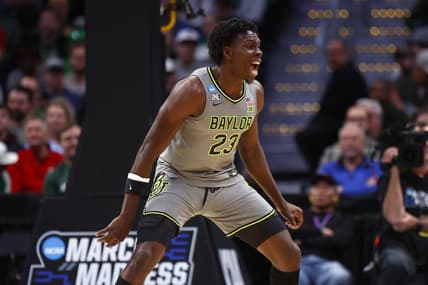 Mar 17, 2023; Denver, CO, USA;  Baylor Bears forward Jonathan Tchamwa Tchatchoua (23) reacts to a play during the second half against UC Santa Barbara Gauchos in the first round of the 2023 NCAA men   s basketball tournament at Ball Arena. Mandatory Credit: Michael Ciaglo-USA TODAY Sports