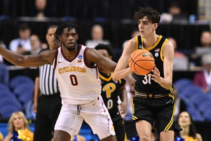 Mar 17, 2023; Greensboro, NC, USA; Pittsburgh Panthers forward Jorge Diaz Graham (31) passes the ball while defended by Iowa State Cyclones forward Tre King (0) during the second half at Greensboro Coliseum. Mandatory Credit: Bob Donnan-USA TODAY Sports