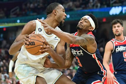 Mar 17, 2023; Cleveland, Ohio, USA; Cleveland Cavaliers forward Evan Mobley (4) drives to the basket against Washington Wizards guard Bradley Beal (3) during the first half at Rocket Mortgage FieldHouse. Mandatory Credit: Ken Blaze-USA TODAY Sports
