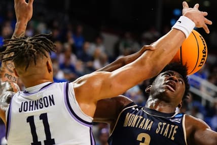 Mar 17, 2023; Greensboro, NC, USA; Kansas State Wildcats forward Keyontae Johnson (11) defends against Montana State Bobcats forward Great Osobor (3) for a rebound in the first half at Greensboro Coliseum. Mandatory Credit: John David Mercer-USA TODAY Sports