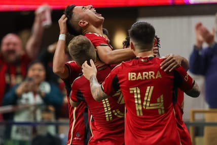 Mar 18, 2023; Atlanta, Georgia, USA; Atlanta United midfielder Thiago Almada (23) celebrates with teammates after a goal against the Portland Timbers at Mercedes-Benz Stadium. Mandatory Credit: Brett Davis-USA TODAY Sports