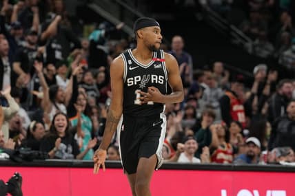 Mar 19, 2023; San Antonio, Texas, USA; San Antonio Spurs guard Blake Wesley (14) celebrates in the second half against the Atlanta Hawks at the AT&T Center. Mandatory Credit: Daniel Dunn-USA TODAY Sports