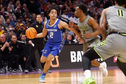 Mar 19, 2023; Denver, CO, USA; Creighton Bluejays guard Ryan Nembhard (2) controls the ball against Baylor Bears guard LJ Cryer (4) in the first half at Ball Arena. Mandatory Credit: Michael Ciaglo-USA TODAY Sports