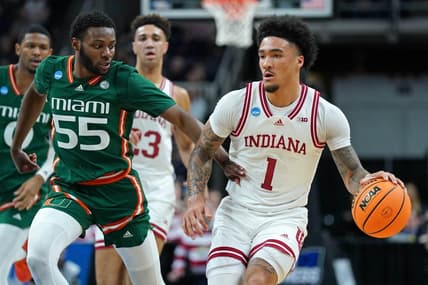 Mar 19, 2023; Albany, NY, USA; Indiana Hoosiers guard Jalen Hood-Schifino (1) drives to the basket against Miami (Fl) Hurricanes guard Wooga Poplar (55) during the first half at MVP Arena. Mandatory Credit: David Butler II-USA TODAY Sports