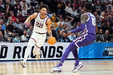Mar 19, 2023; Denver, CO, USA; Gonzaga Bulldogs forward Anton Watson (22) controls the ball against TCU Horned Frogs guard Damion Baugh (10) in the second half at Ball Arena. Mandatory Credit: Ron Chenoy-USA TODAY Sports
