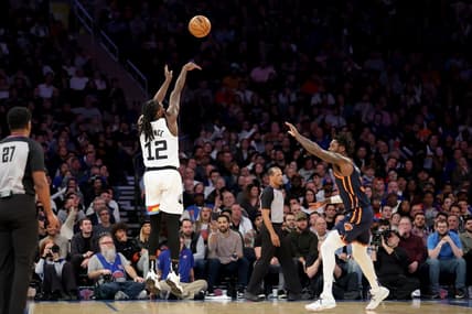 Mar 20, 2023; New York, New York, USA; Minnesota Timberwolves forward Taurean Prince (12) shoots a three point shot over New York Knicks forward Julius Randle (30) during the fourth quarter at Madison Square Garden. Mandatory Credit: Brad Penner-USA TODAY Sports