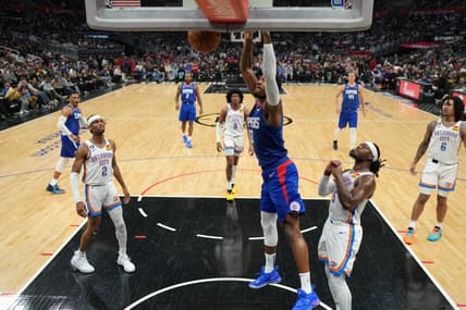 Mar 21, 2023; Los Angeles, California, USA; LA Clippers forward Paul George (13) dunks the ball against the Oklahoma City Thunder in the second half at Crypto.com Arena. Mandatory Credit: Kirby Lee-USA TODAY Sports