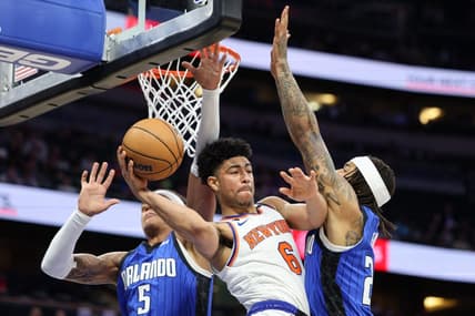Mar 23, 2023; Orlando, Florida, USA;  New York Knicks guard RJ Barrett (9) passes the ball defended by Orlando Magic guard Markelle Fultz (20) in the first quarter at Amway Center. Mandatory Credit: Nathan Ray Seebeck-USA TODAY Sports