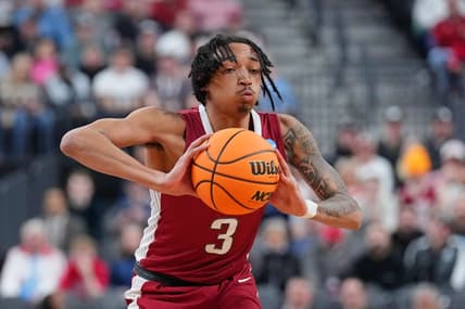 Mar 23, 2023; Las Vegas, NV, USA; Arkansas Razorbacks guard Nick Smith Jr. (3) passes the ball against the UConn Huskies during the first half at T-Mobile Arena. Mandatory Credit: Joe Camporeale-USA TODAY Sports