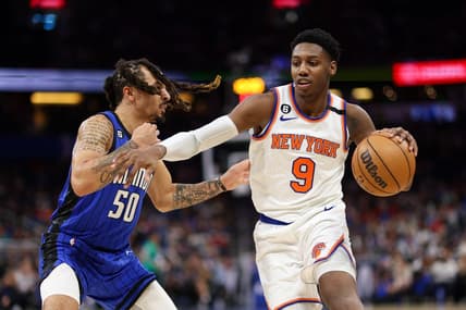 Mar 23, 2023; Orlando, Florida, USA;  New York Knicks guard RJ Barrett (9) controls the ball from Orlando Magic guard Cole Anthony (50) in the second quarter at Amway Center. Mandatory Credit: Nathan Ray Seebeck-USA TODAY Sports