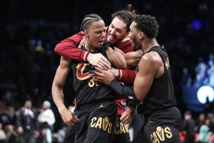 Mar 23, 2023; Brooklyn, New York, USA;  Cleveland Cavaliers forward Isaac Okoro (35) celebrates with his teammates after scoring the game wining basket to beat the Brooklyn Nets 116-114 at Barclays Center. Mandatory Credit: Wendell Cruz-USA TODAY Sports