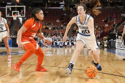 Mar 24, 2023; Greenville, SC, USA; Villanova Wildcats forward Maddy Siegrist (20) dribbles against Miami Hurricanes forward Destiny Harden (3) during the NCAA Women   s Tournament at Bon Secours Wellness Arena. Mandatory Credit: Jim Dedmon-USA TODAY Sports
