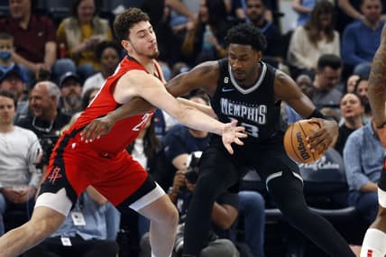 Mar 24, 2023; Memphis, Tennessee, USA; Memphis Grizzlies forward Jaren Jackson Jr. (13) drives to the basket as Houston Rockets center Alperen Sengun (28) defends during the first half at FedExForum. Mandatory Credit: Petre Thomas-USA TODAY Sports